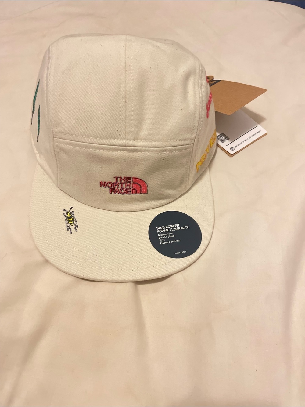 The North Face Men Cream Cap with Colorful Embroidered Logos
